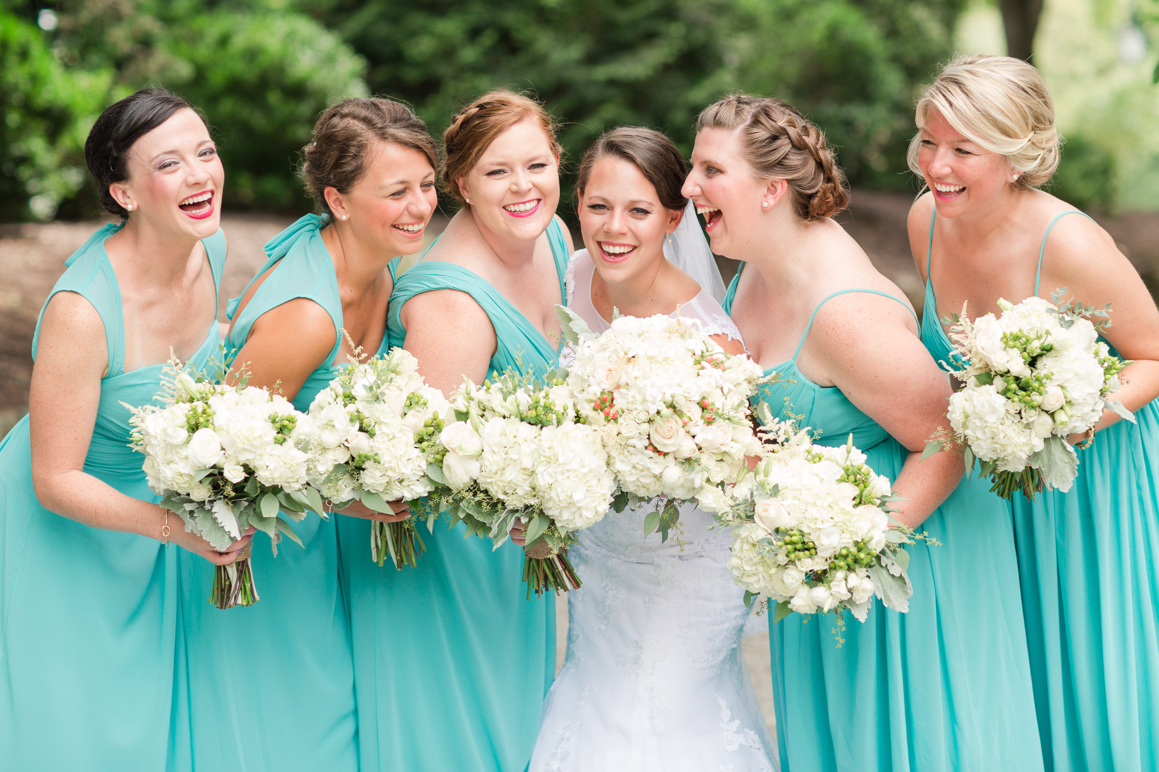 Lauren shares a happy moment with her bridesmaids