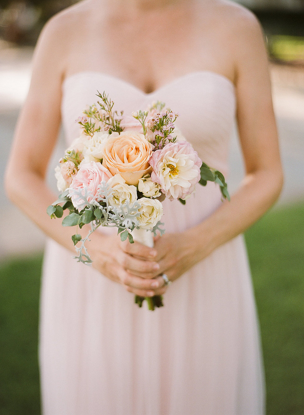 bridesmaid holding a bouquet