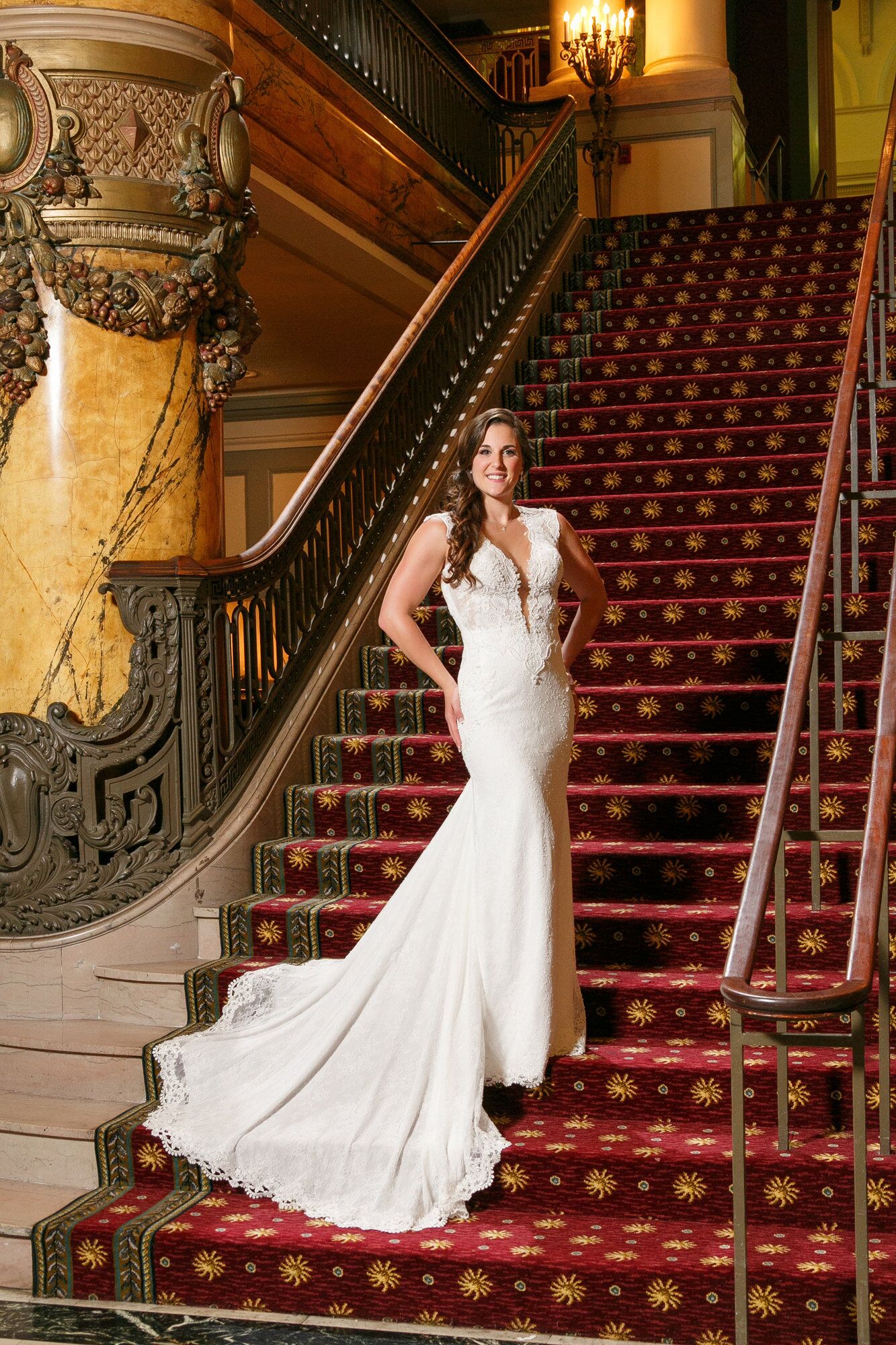 amanda posed on the jefferson hotel staircase